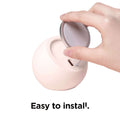 Hand installing Mi CHARGE Silicone Stand Charger, an easy-to-install, eco-friendly wireless mobile charger holder.